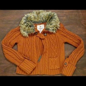Dark orange sweater
